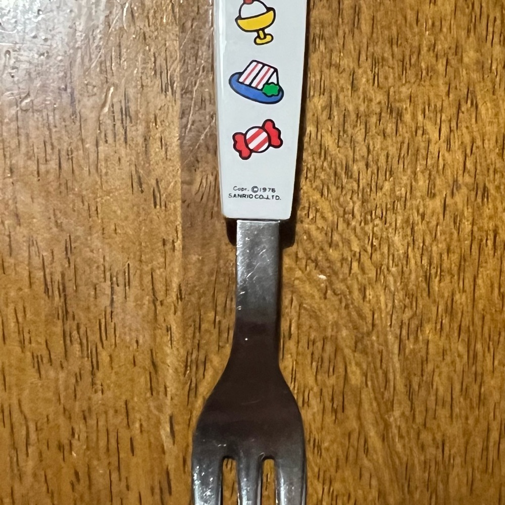 Sanrio Hello Kitty Vintage Stainless Steel Silver Fork with Cute Sanrio Icons.